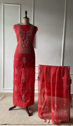 The set on the mannequin with its dupatta beside it