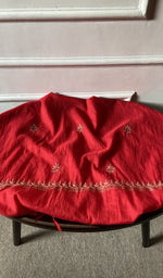 Bottom fabric draped over the stool
