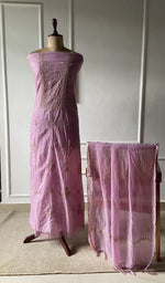 The set on the mannequin with its dupatta beside it