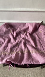 Bottom fabric draped over the stool