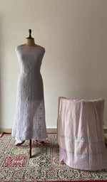 The set on the mannequin with its dupatta beside it