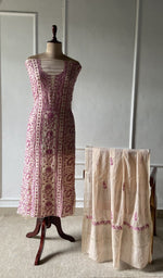 The set on the mannequin with its dupatta beside it
