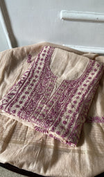 The folded set, kurta on top