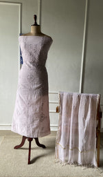 The set on the mannequin with its dupatta beside it