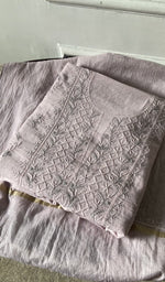 The folded set, kurta on top