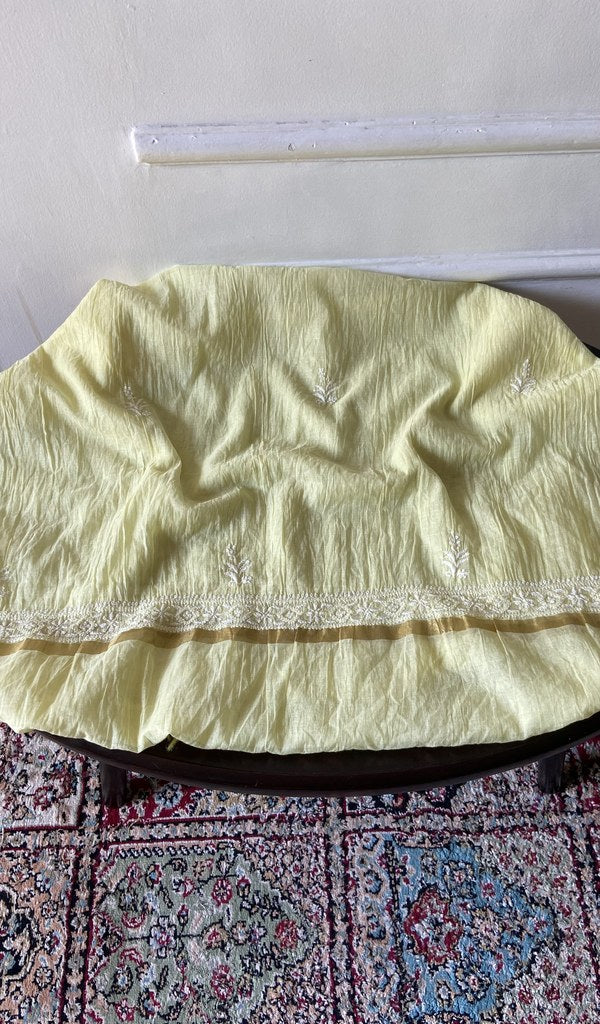 Yellow mul chanderi chikankari 3 pc unstitched suit set laid out