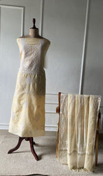 The set on the mannequin with its dupatta beside it