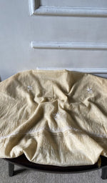 Bottom fabric draped over the stool