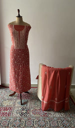 The set on the mannequin with its dupatta beside it