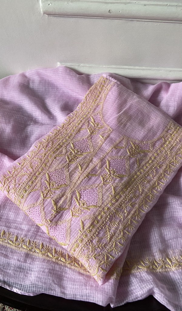lilac chikankari set folded, worked panel on top