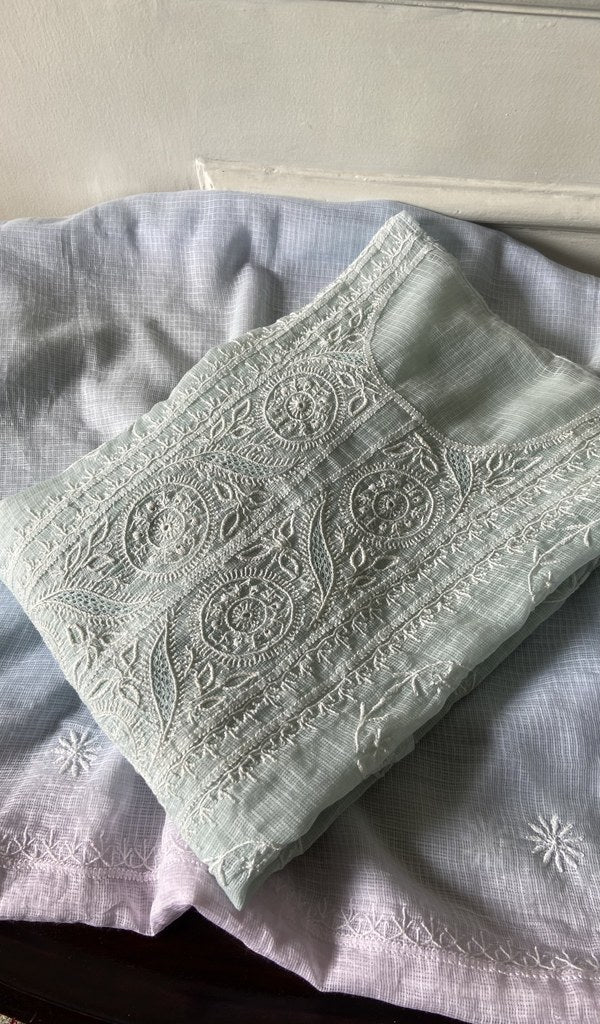blue grey chikankari set folded, worked panel on top
