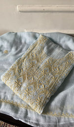 Load image into Gallery viewer, pale blue chikankari set folded, worked panel on top