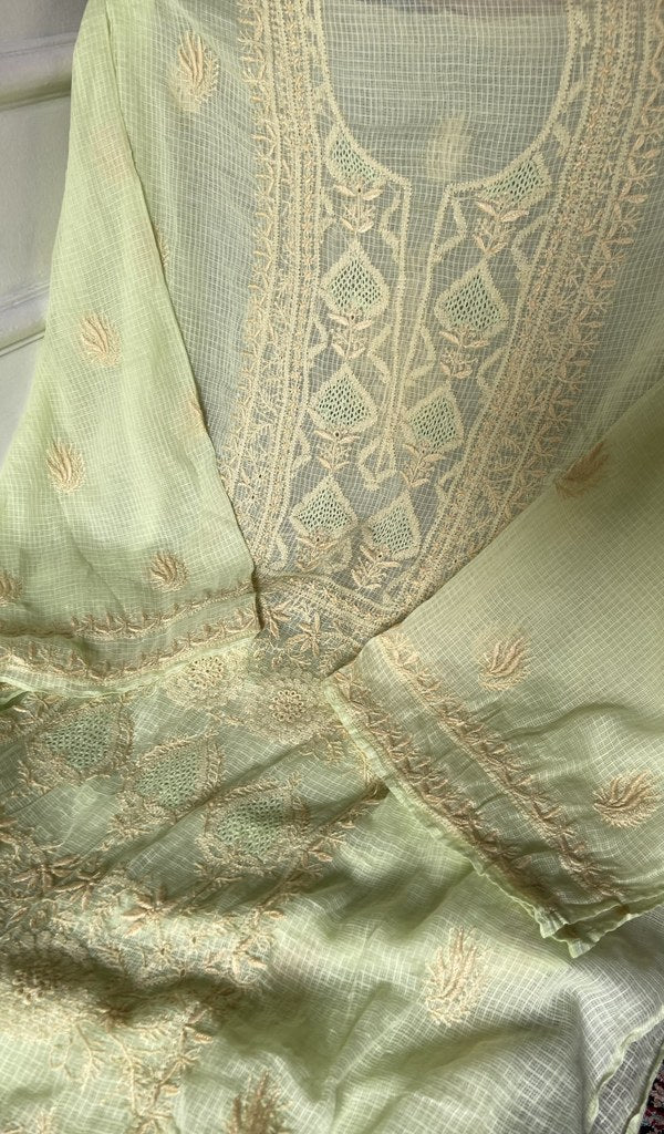 close view of the hand embroidery, pale yellow green pure kota cotton