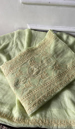 Load image into Gallery viewer, pale yellow green chikankari set folded, worked panel on top