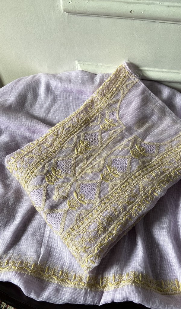 ivory chikankari set folded, worked panel on top