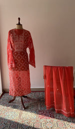 The set on the mannequin with its dupatta beside it