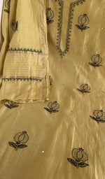 Fine chikankari with anar motifs and haath ki jaali on the butter yellow mul chanderi