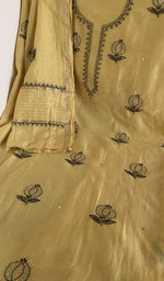 Butter yellow mul chanderi laid flat on the table