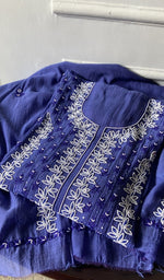 blue pure mul chanderi chikankari suit set, folded