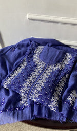 border and hem of the blue kurta piece