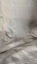 fine chikankari with beads cutdana and sequins on neck across the body of the kurta