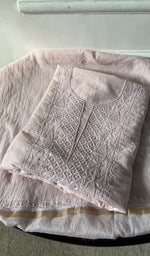The folded set, kurta on top