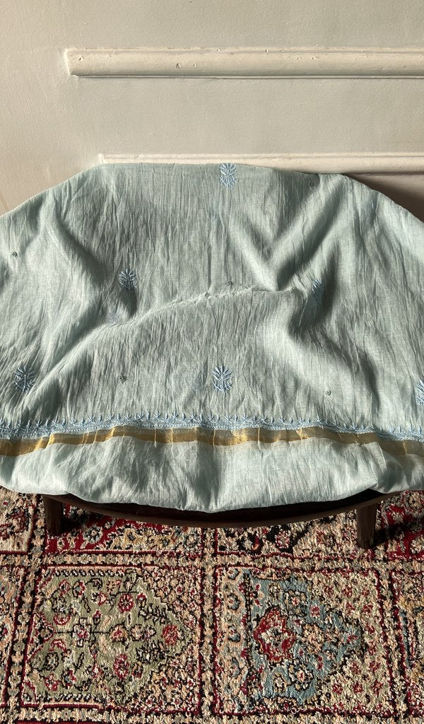 Mint mul chanderi chikankari 3 pc unstitched suit set laid out
