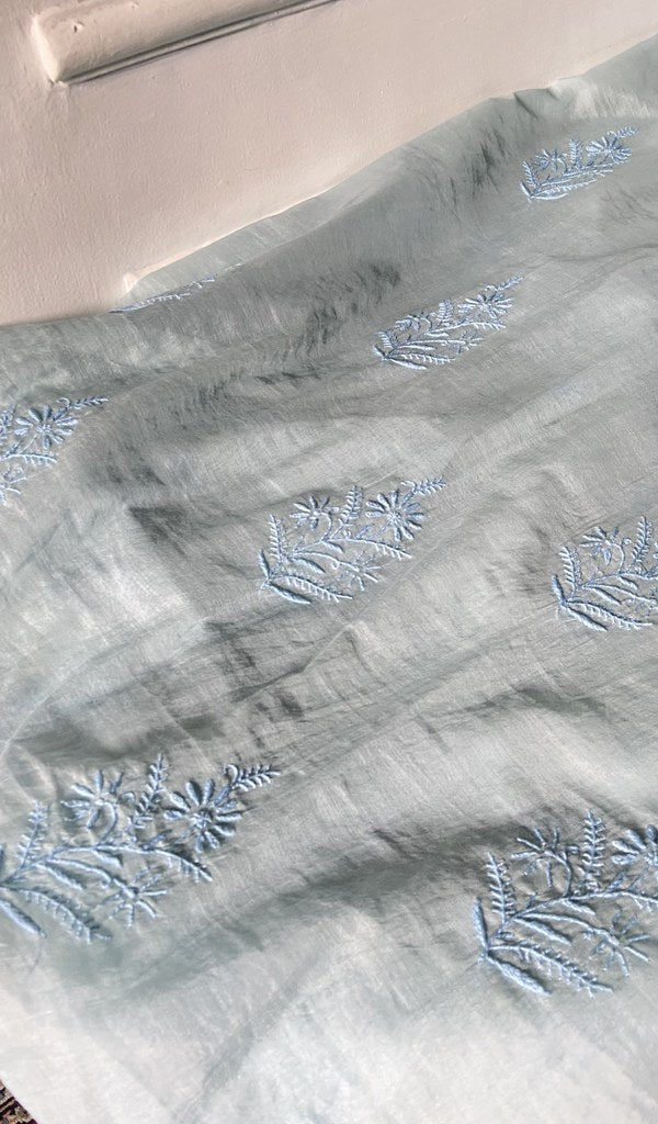 Chikankari across the body of the mint kurta piece