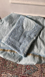 将图像加载到图库查看器中， Kurta piece folded over the bottom