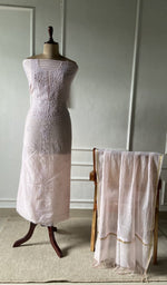 The set on the mannequin with its dupatta beside it