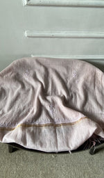 Bottom fabric draped over the stool