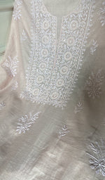 fine chikankari with beads cutdana and sequins on neck across the body of the kurta