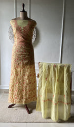 green pure mul chanderi chikankari set on the mannequin with the dupatta