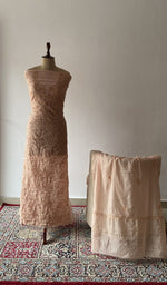 The set on the mannequin with its dupatta beside it