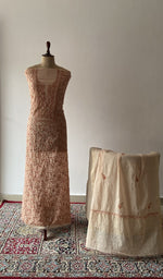 The set on the mannequin with its dupatta beside it