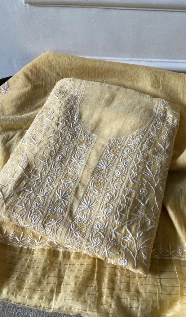 yellow pure mul chanderi chikankari suit set, folded