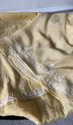 border and hem of the yellow kurta piece