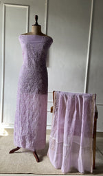 The set on the mannequin with its dupatta beside it