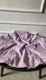 Bottom fabric draped over the stool