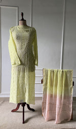 The set on the mannequin with its dupatta beside it