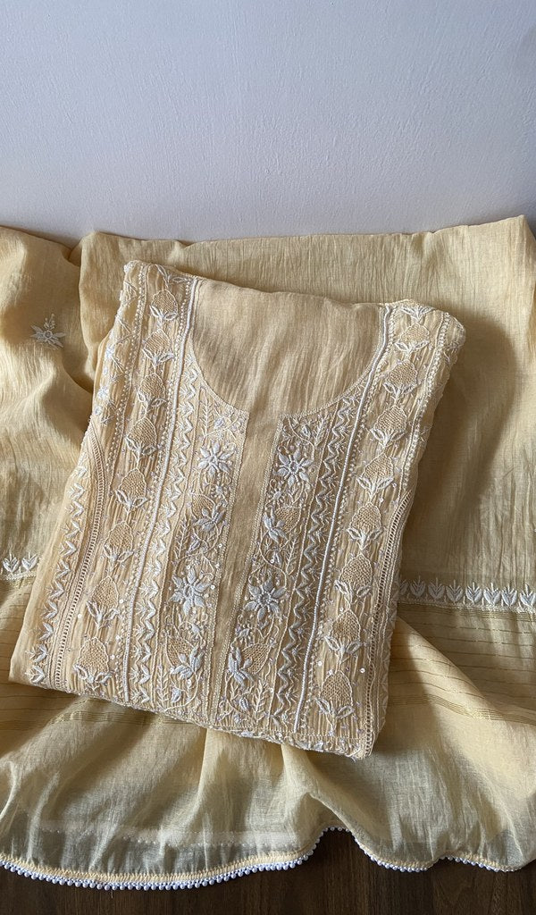 Yellow pure mul chanderi kurta piece folded, fine chikankari with haath ki jaali
