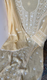 Beads and cutdana along the placket