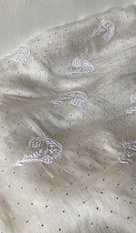 Chikankari across the body of the off kurta piece