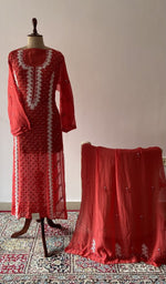 The set on the mannequin with its dupatta beside it