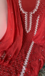 Beads and cutdana along the placket