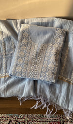 Folded powder blue mul chanderi kurta, front view
