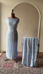 Powder blue mul chanderi set on the mannequin with its dupatta