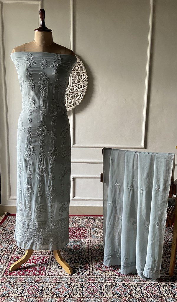 Grey blue viscose georgette chikankari 2 pc unstitched suit set laid out