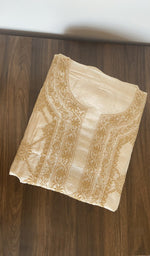 Folded beige tussar silk kurta, gala and neckline work