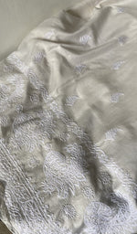 Bottom fabric draped over the stool
